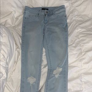 Barely worn uniqlo ripped skinny jeans